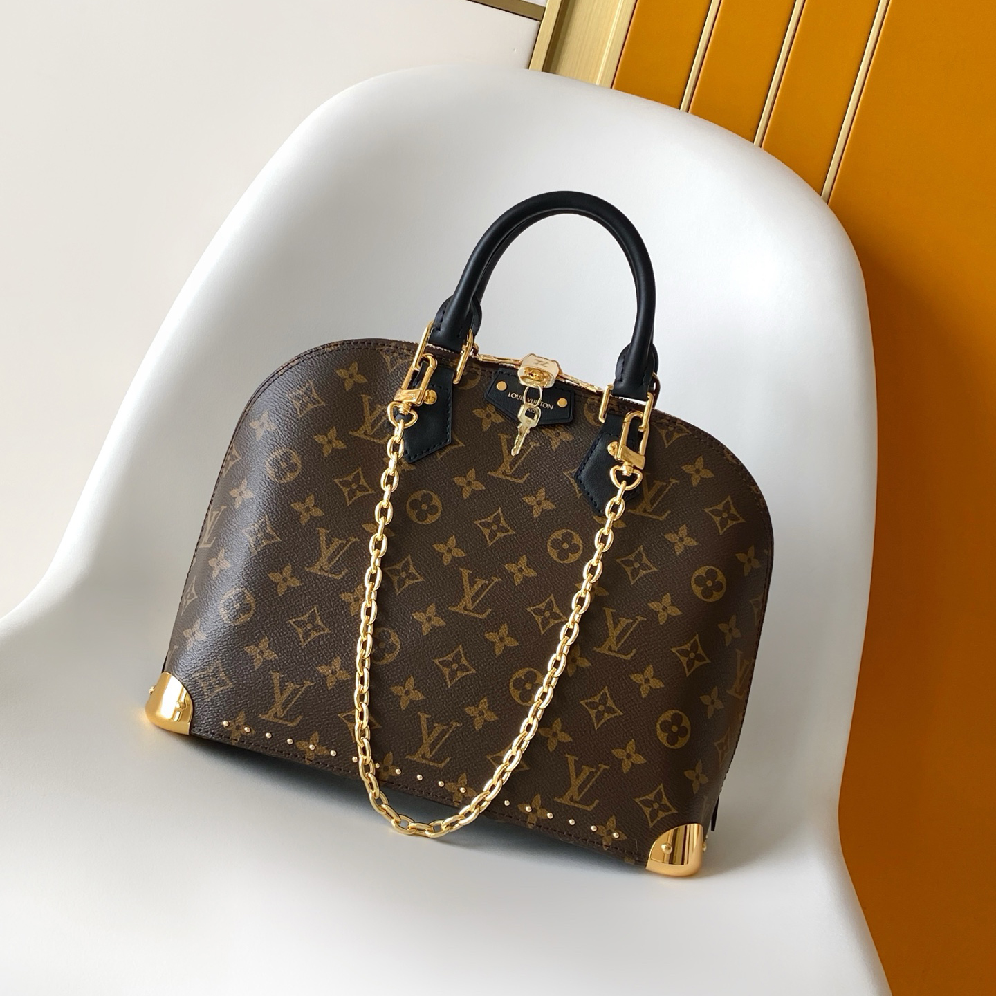 M27216 LV ALMA Trunk Small Handbag